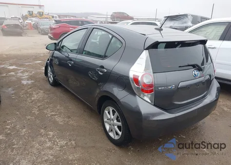 2014 Toyota Prius C Three z USA, uszkodzony, nr VIN JTDKDTB32E1572744